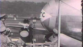 Watch First Lady Bess Truman Be Thwarted in Her Attempt to Christen an Airplane